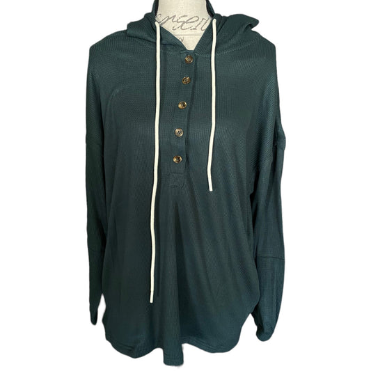 A dark green hooded long-sleeve top with a button-down front and white drawstrings, displayed on a mannequin torso against a white background.