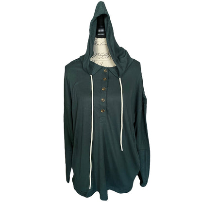 Green hooded shirt on a mannequin with a white background