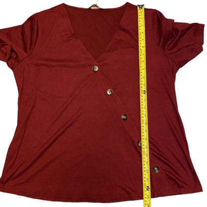 A maroon short-sleeve V-neck top with a buttoned front, shown flat with a yellow measuring tape running vertically along the side to indicate size.