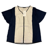 Front of shirt laying flat