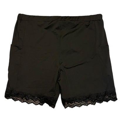 Back of Black shorts with lace trim on a white background