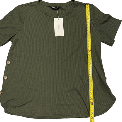 Length of green shirt