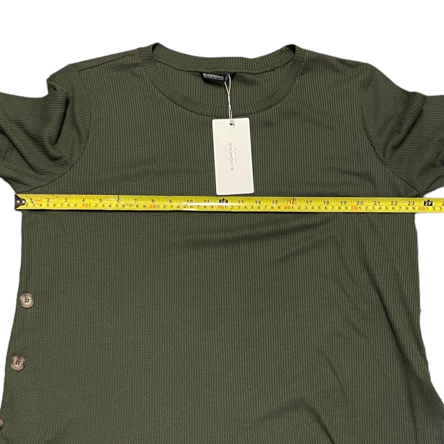 Pit to pit of green shirt