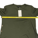 Pit to pit of green shirt
