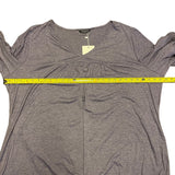 Pit to pit of purple shirt