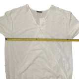 Pit to pit of white shirt