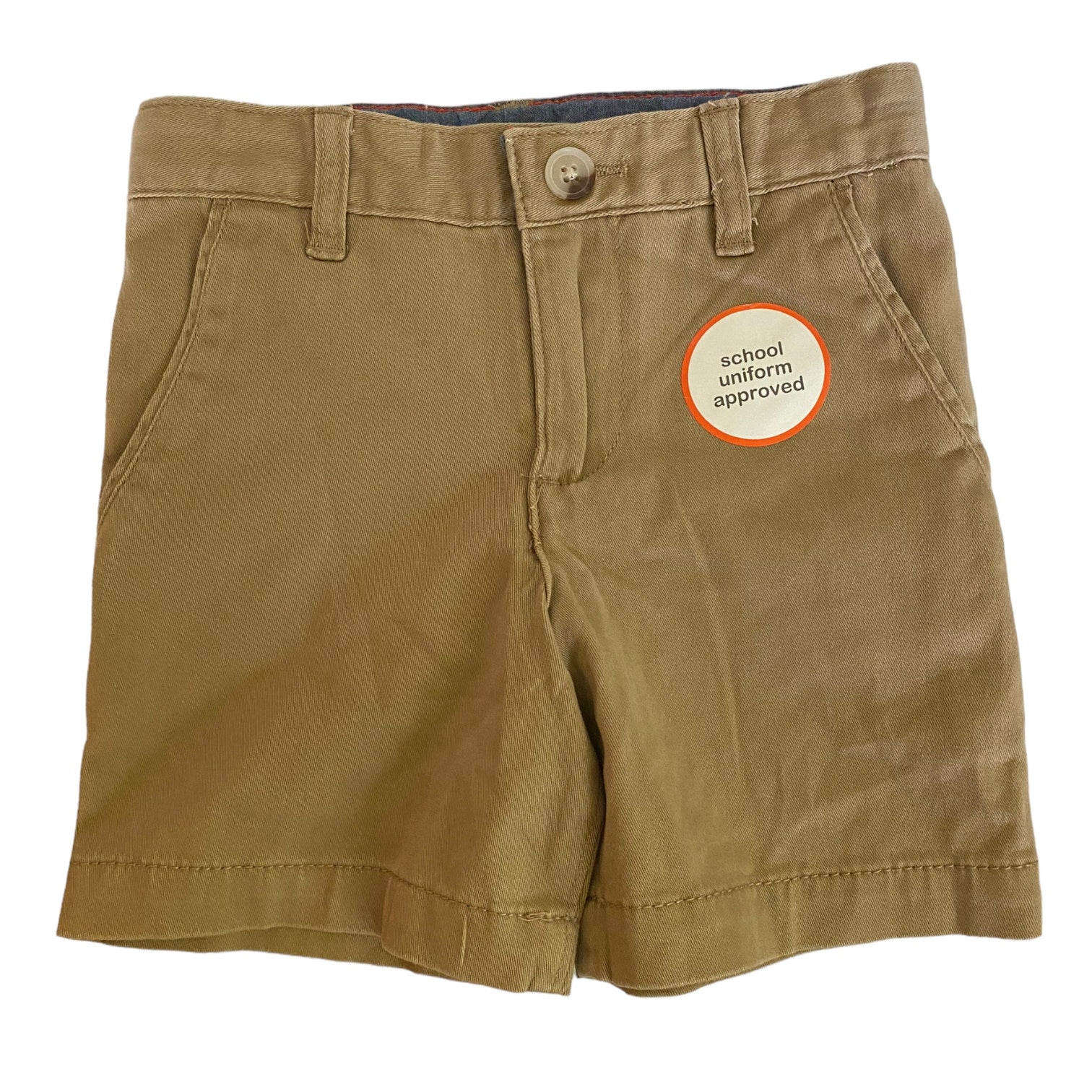 A pair of beige cotton chino shorts for boys with adjustable waistband, button/zip front, and two front and back pockets.