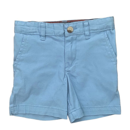 Front of Light blue shorts with a button on a white background