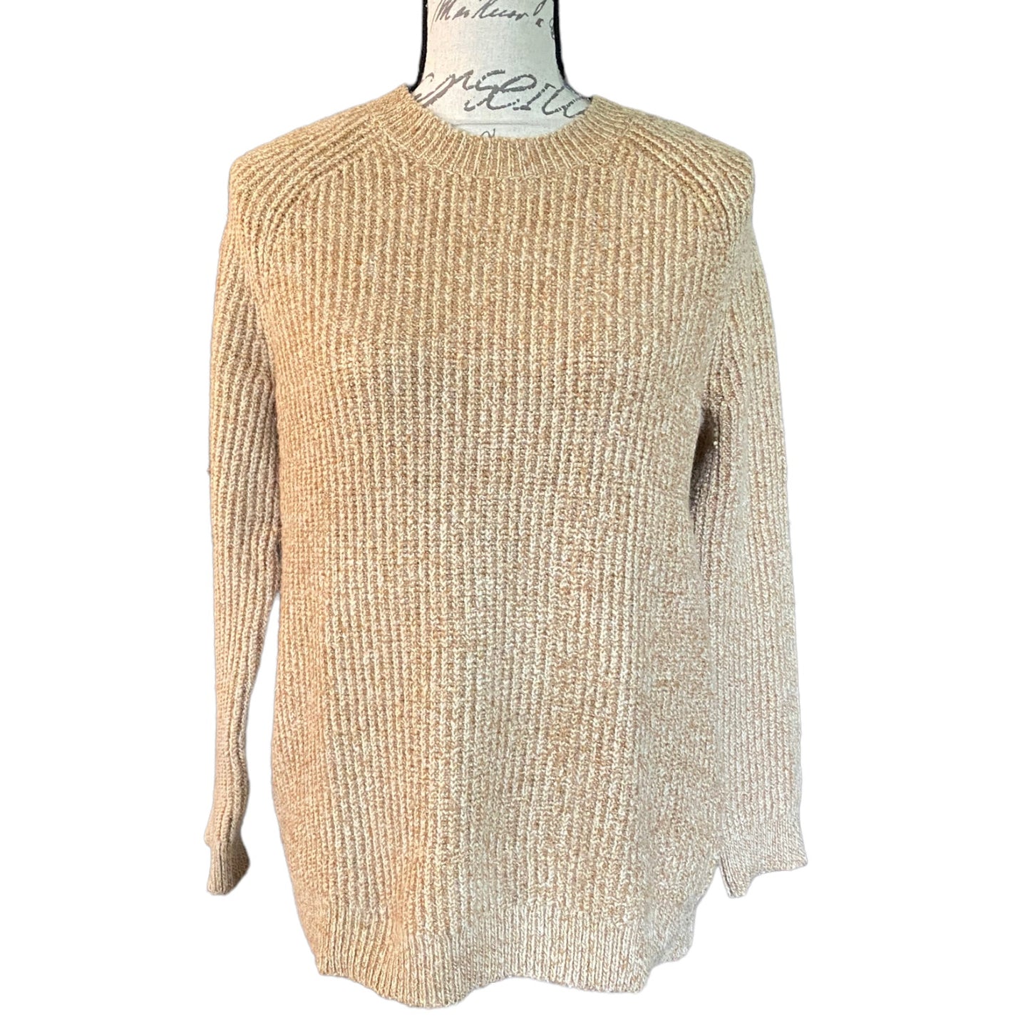 Front of brown ribbed sweater on a mannequin against a white background