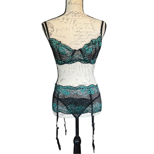 Front of Black lace lingerie set on a mannequin with a white background