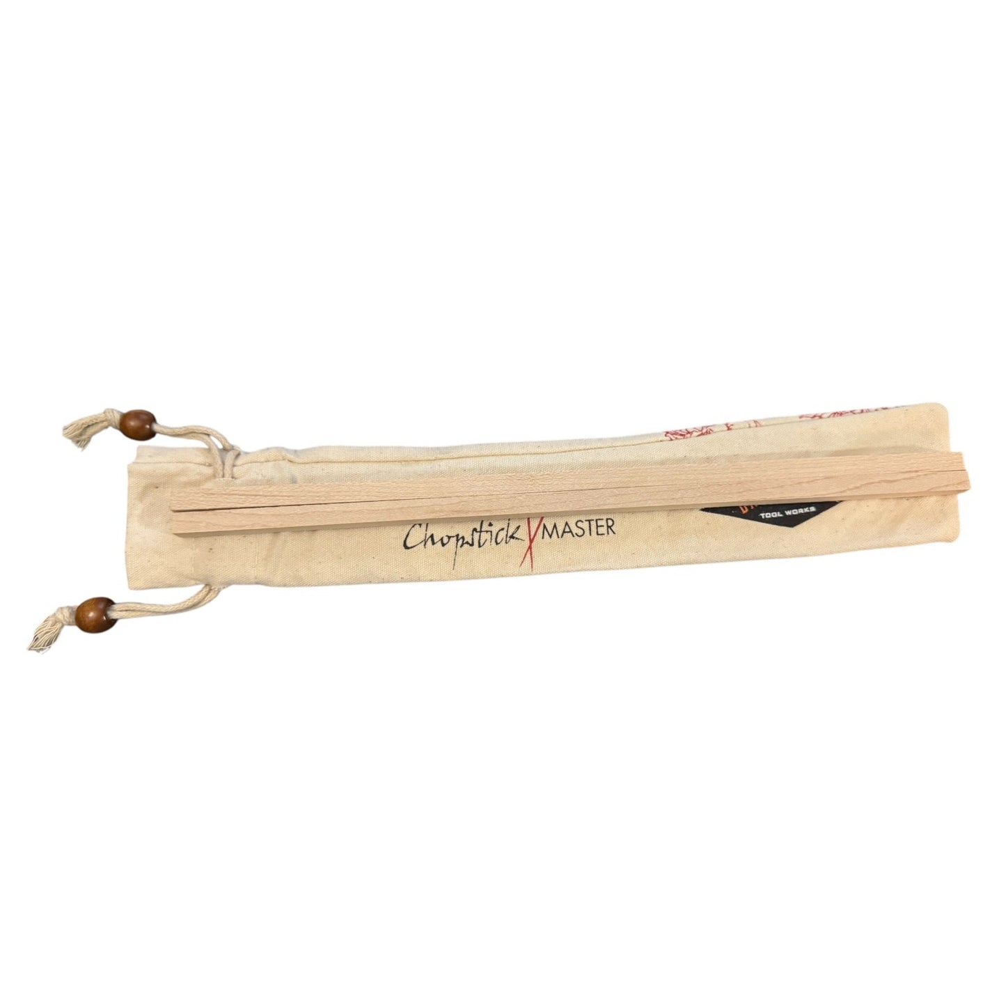 A set of wooden drumsticks on a beige canvas drawstring pouch with 'Chopstick MASTER' printed on the front, set against a plain white background.