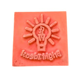Red rubber stamp with a light bulb design and 'Blighty Stamps' text on a white background