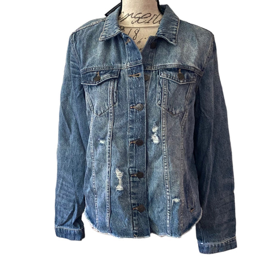 Blue denim jacket on a mannequin with a white background