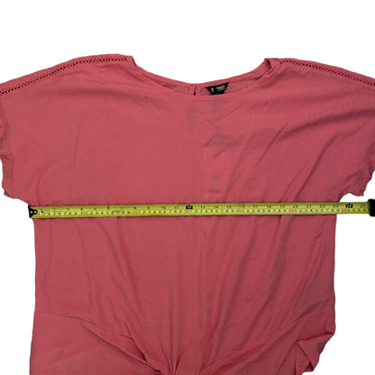 shirt with a measuring tape across it on a white background