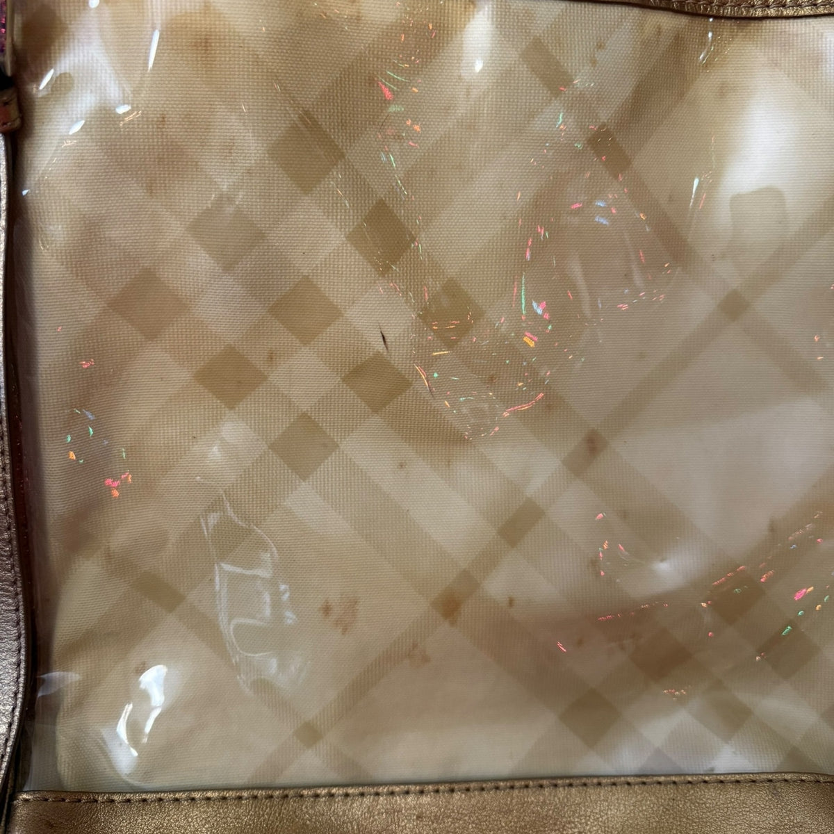 Close-up of a plaid patterned fabric with with issues