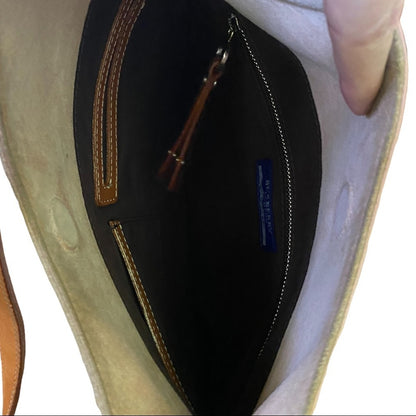 Interior of pink Burberry crossbody purse