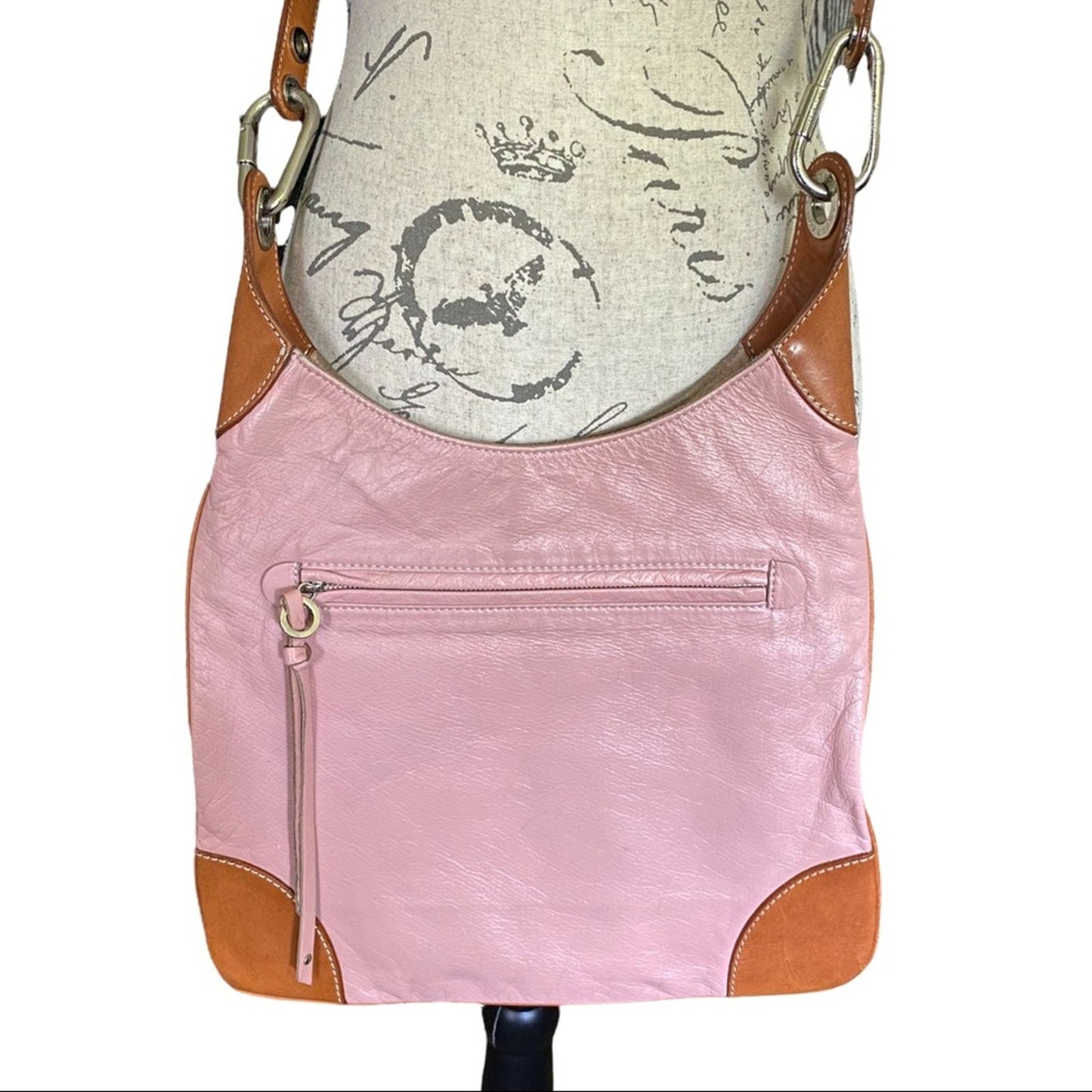 Close up of pink Burberry crossbody purse