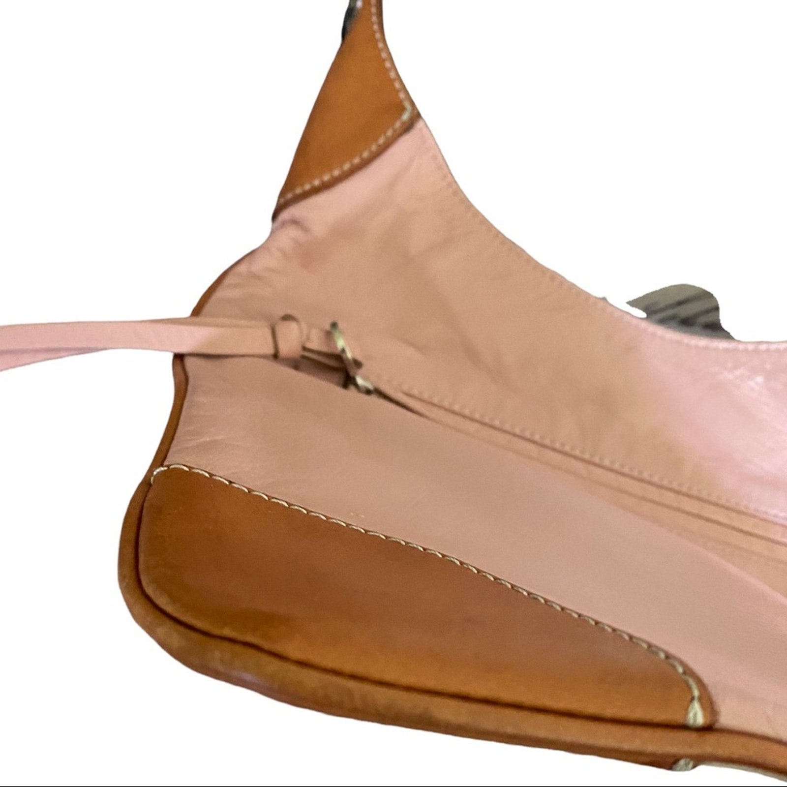 Corner 1 of pink Burberry crossbody purse