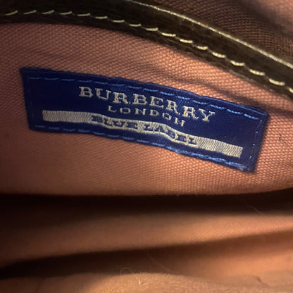 Burberry label on a pink fabric background