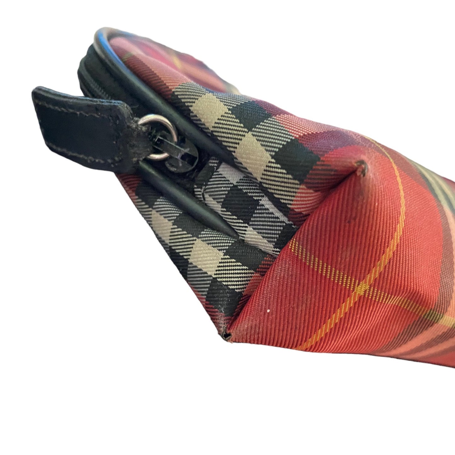 Plaid patterned pouch with a zipper on a white background