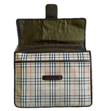 Open flap of Burberry portfolio clutch