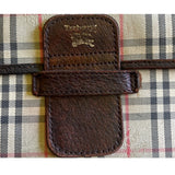 Leather flap of Burberry portfolio clutch