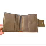 brown interior of bvlgari wallet