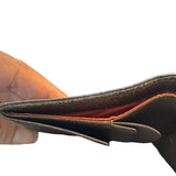 top edges of brown bvlgari wallet