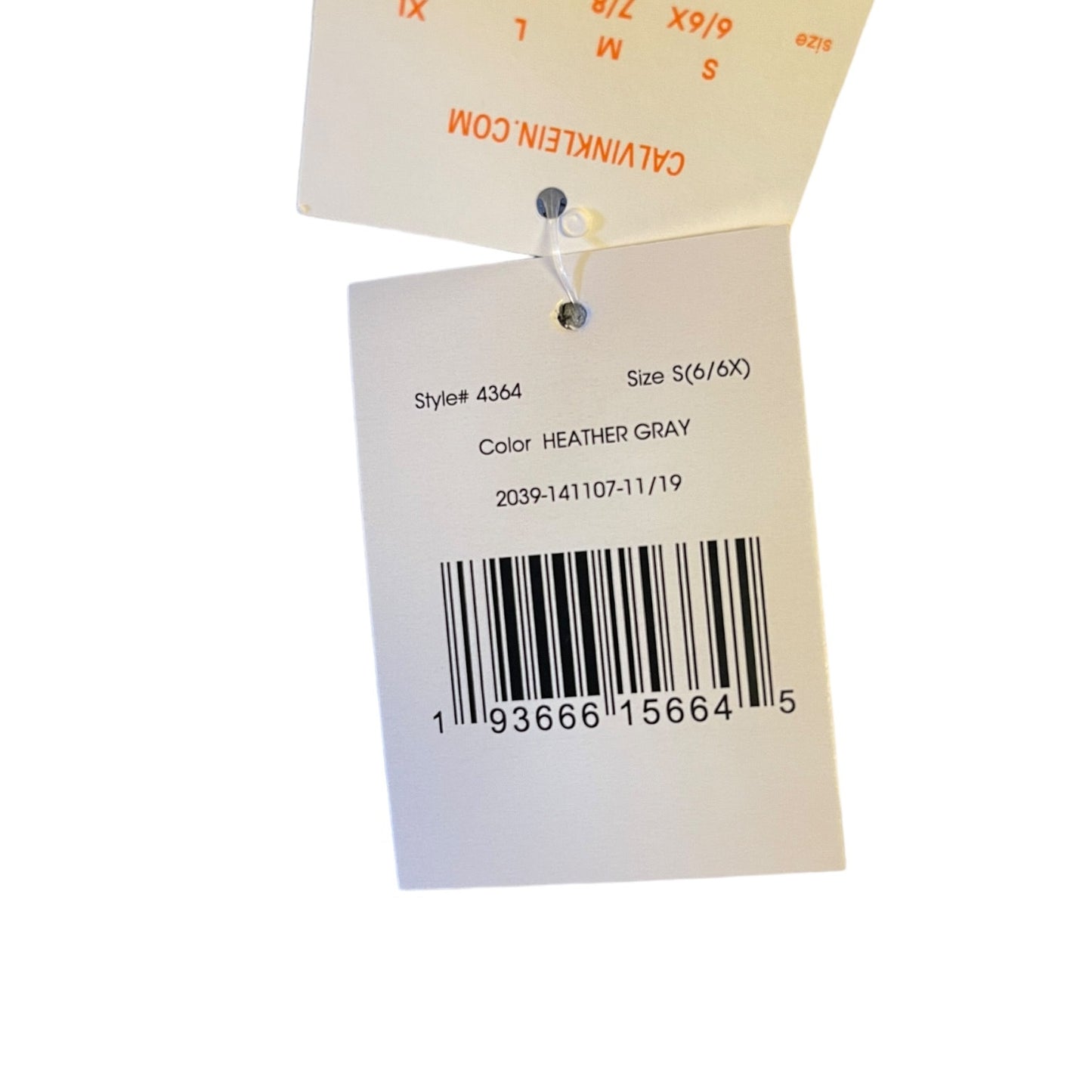 Clothing tag with size, color, and barcode information on a white background
