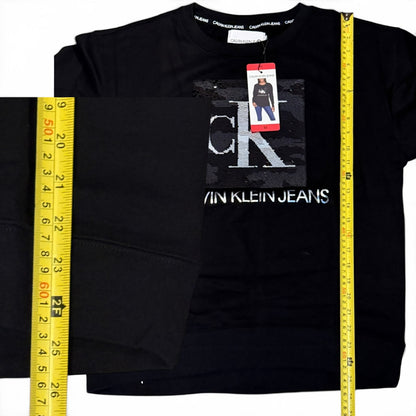 Black Calvin Klein Jeans sweatshirt with a measuring tape on a white background