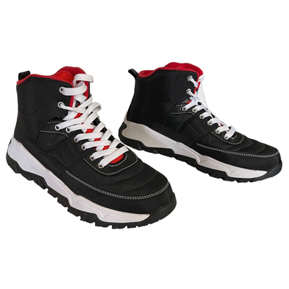 A pair of black high-top sneakers with white laces, white midsoles, and red accents on the collar lining and eyelets, shown against a plain white background.