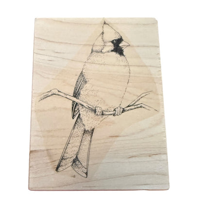 Cardinal wood block rubber stamp on a white background. 