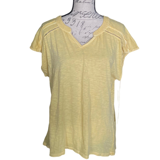 A pale yellow short-sleeve V-neck top displayed on a mannequin torso against a plain white background.