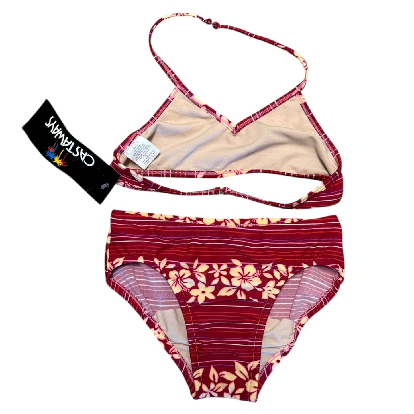 Pink floral bikini set with a visible brand tag on a white background