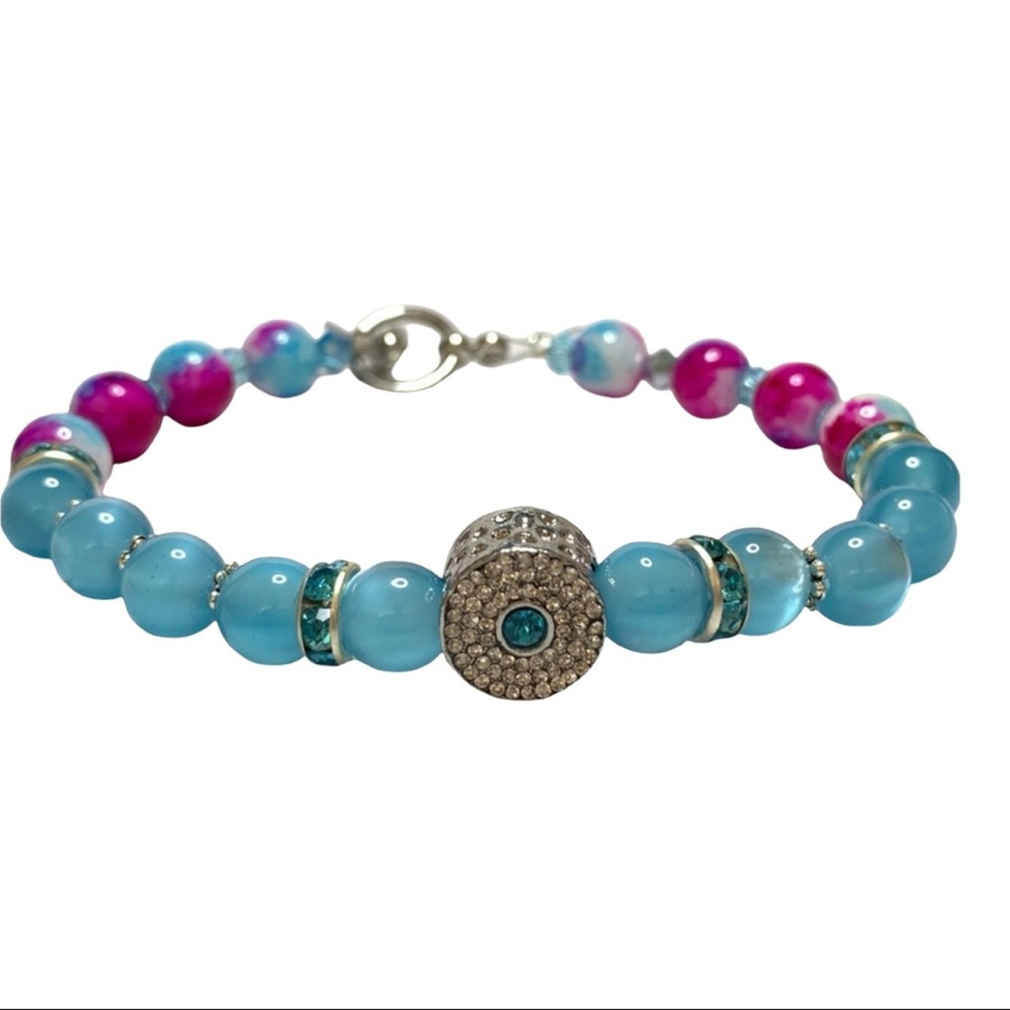 Bracelet with blue and pink beads on a white background