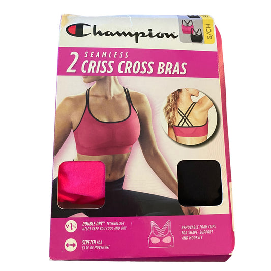Champion brand packaging of two criss cross bras in pink and black on a white background.