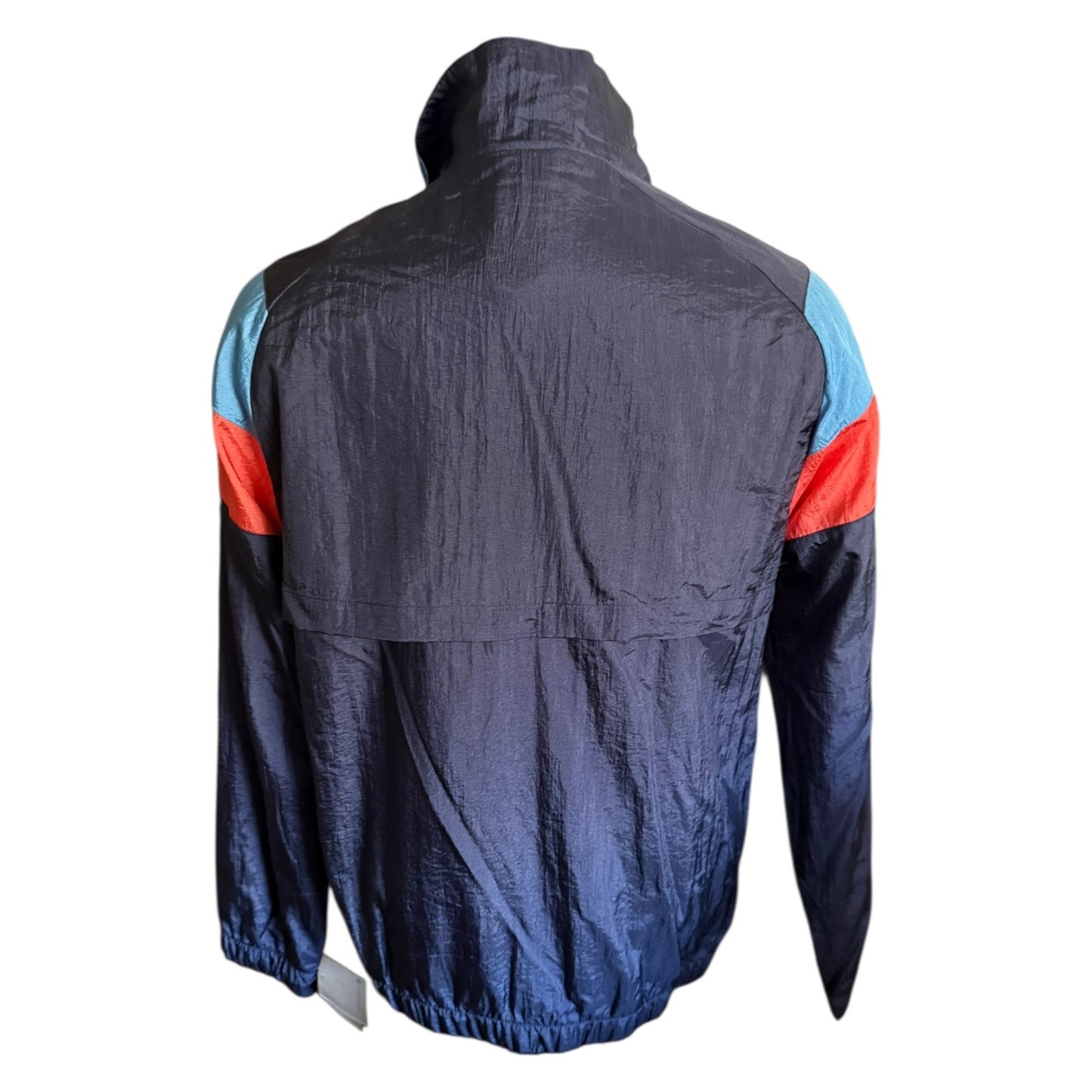 Back view of a dark blue jacket with red and blue accents on a white background