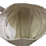 Interior of Beige bag with a zipper on a white background