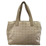 Beige tote bag with a subtle pattern on a white background