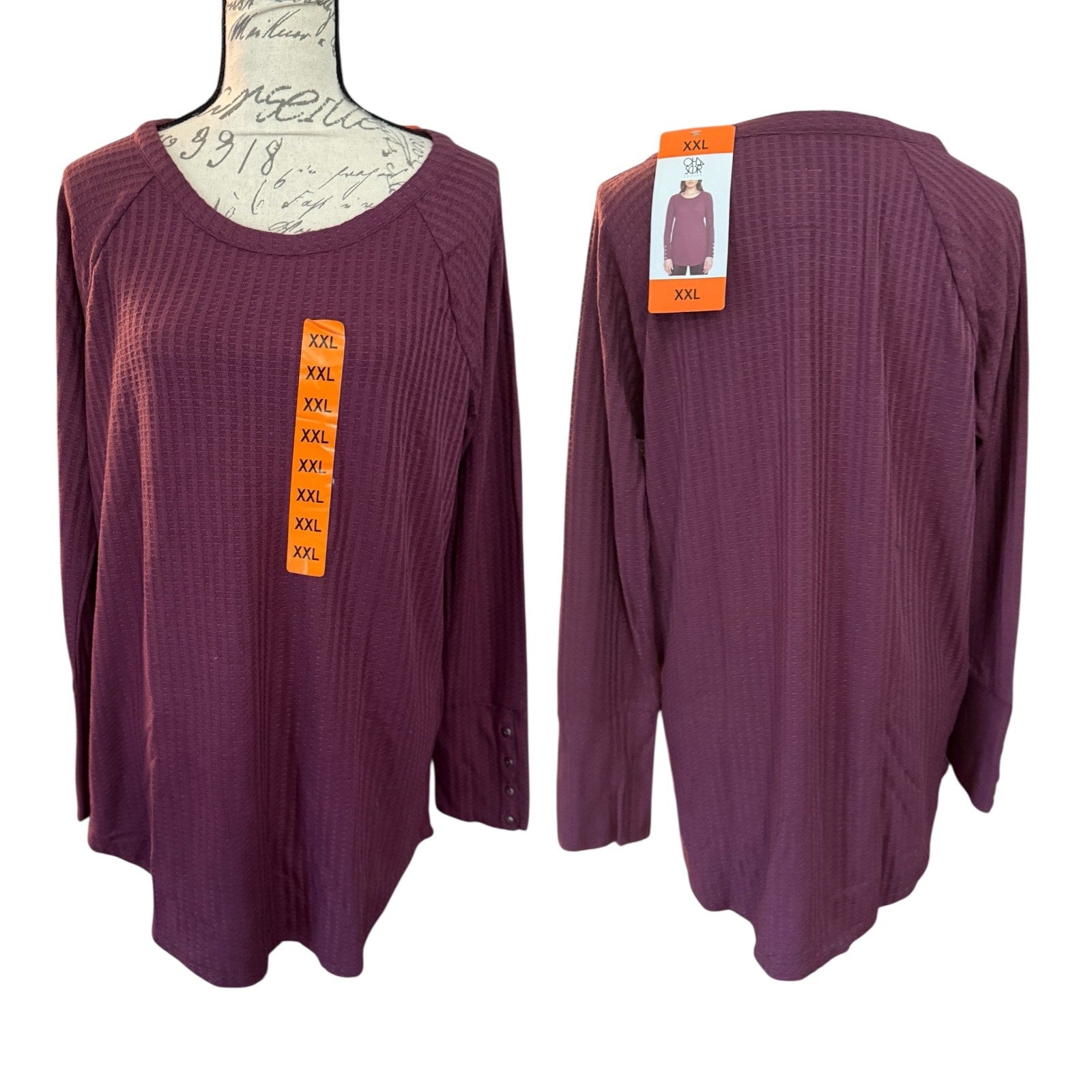 Purple long-sleeve top on a mannequin with size tag, front and back views.