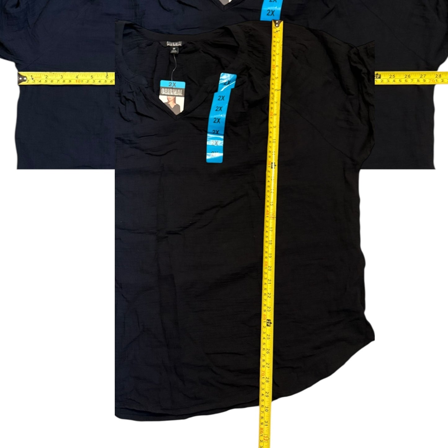 Black shirt with measurements marked on a white background