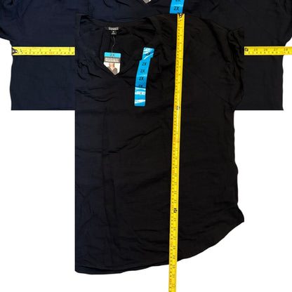 Black shirt with measurements marked on a white background