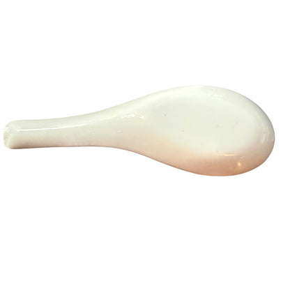 White spoon rest on a white background