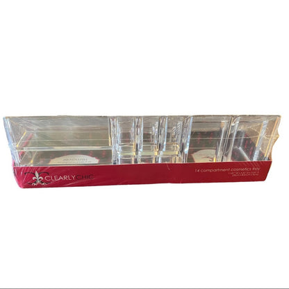 A 14-compartment clear plastic cosmetics tray with a red base band printed with the brand name 'CLEARLY CHIC'.