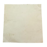 Back of red sticker with dirt and wrinkles