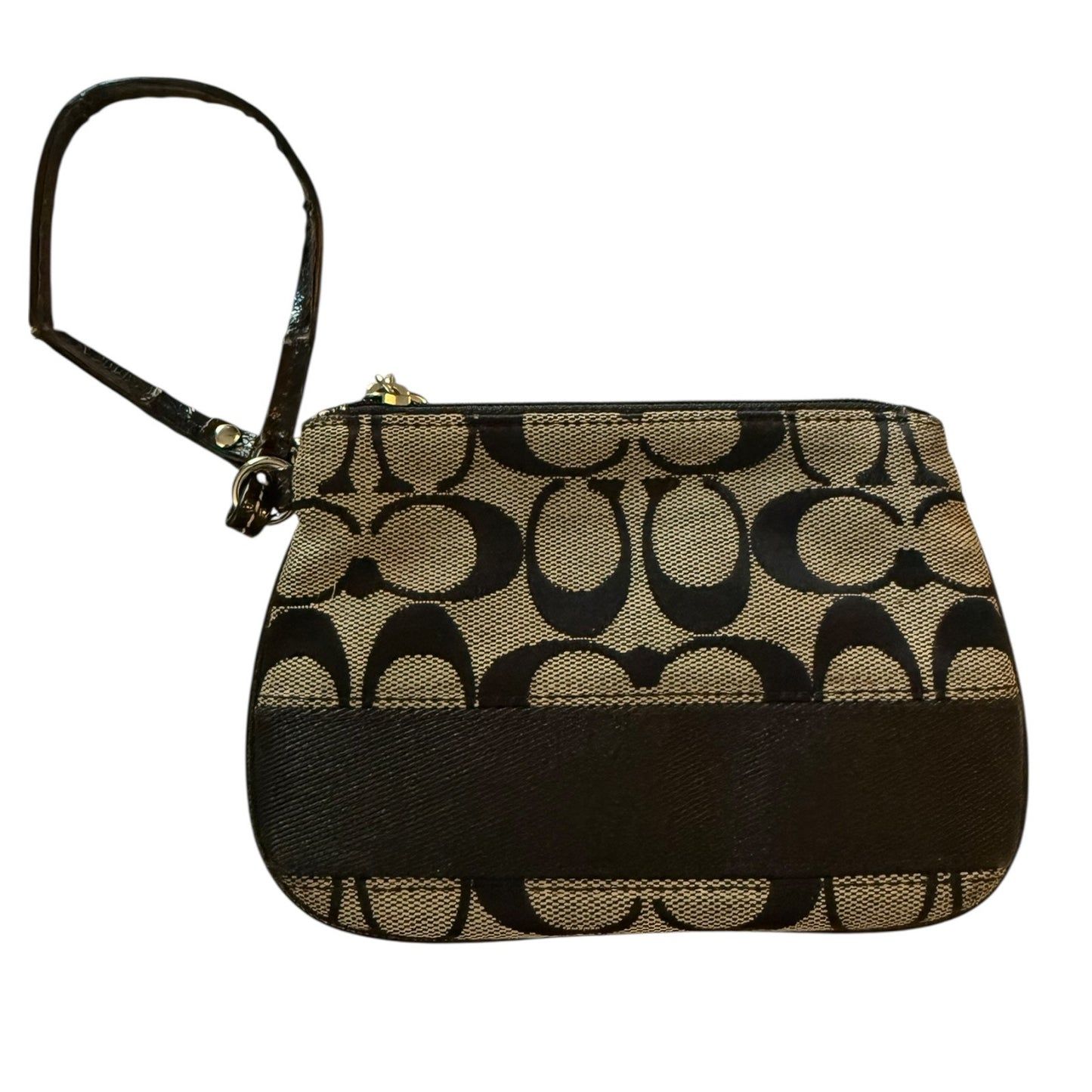 Coach wristlet with signature pattern on a white background