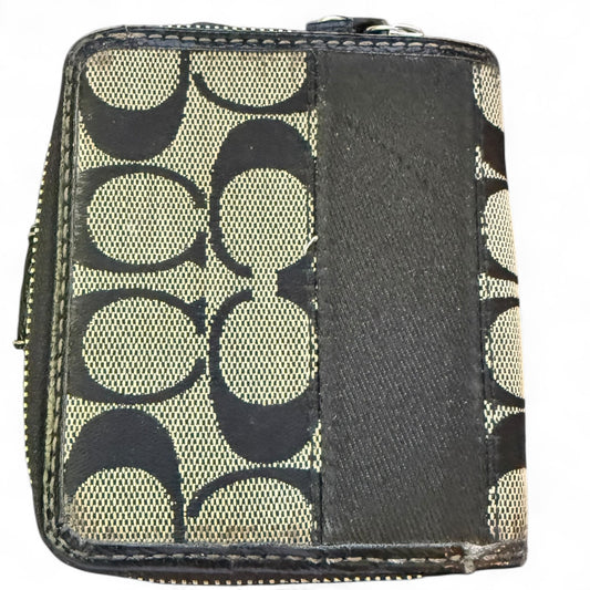 Small wallet with a CC patterned design on a white background