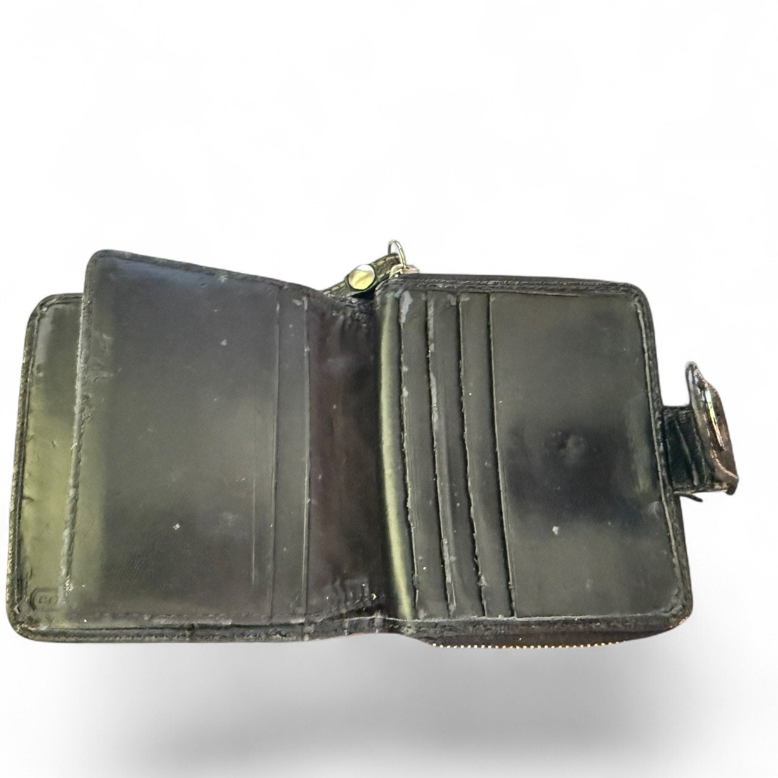 leather wallet with visible wear on a white background