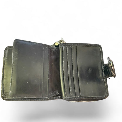 leather wallet with visible wear on a white background