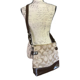 Patterned purse with brown accents on a white background